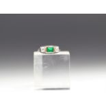 Art Deco ring in white and yellow gold with diamonds and emerald