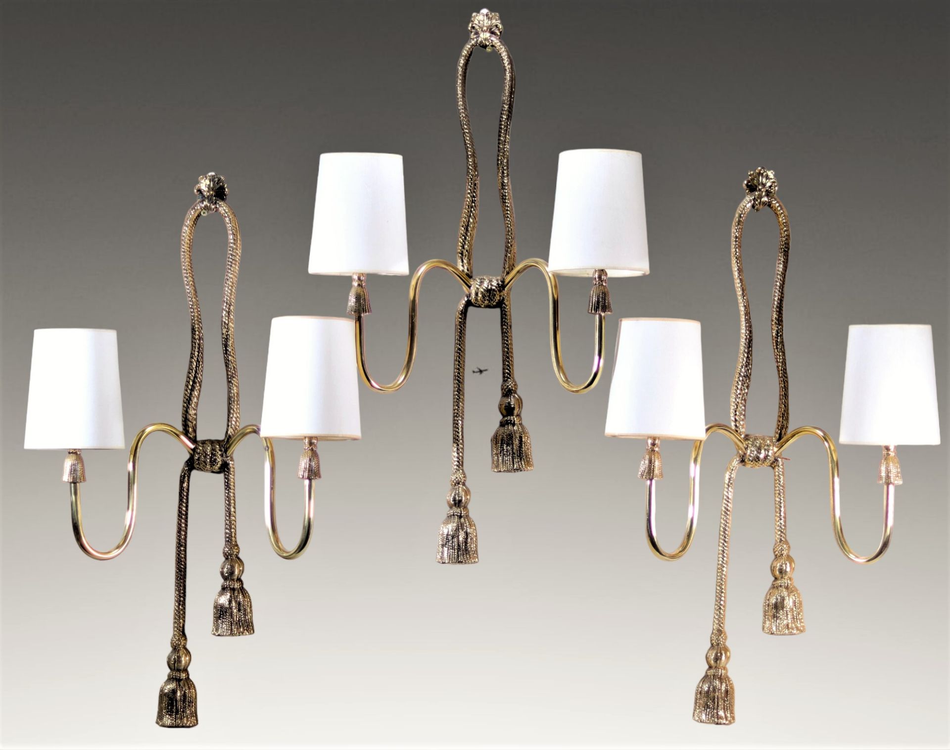 (3) Valenti three large brass wall lights forming cords from the 1960s/1970s