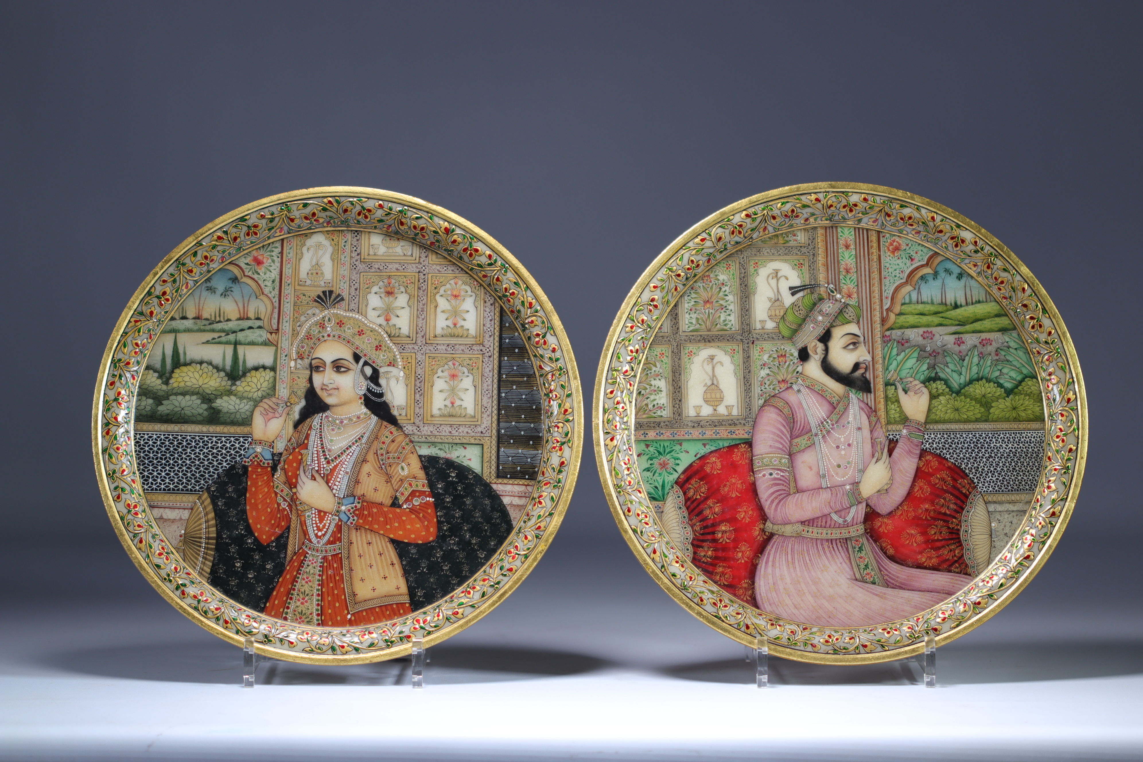 Pair of marble medallions painted with figures India