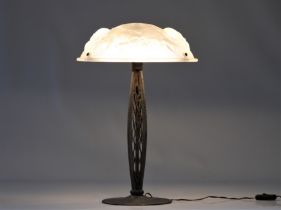 Art Deco desk lamp with hammered bronze base with 3 points of light and stylised glass hood signed "