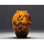 Rare Galle Emile vase in multi-layer with hazel tree decoration on a yellow background