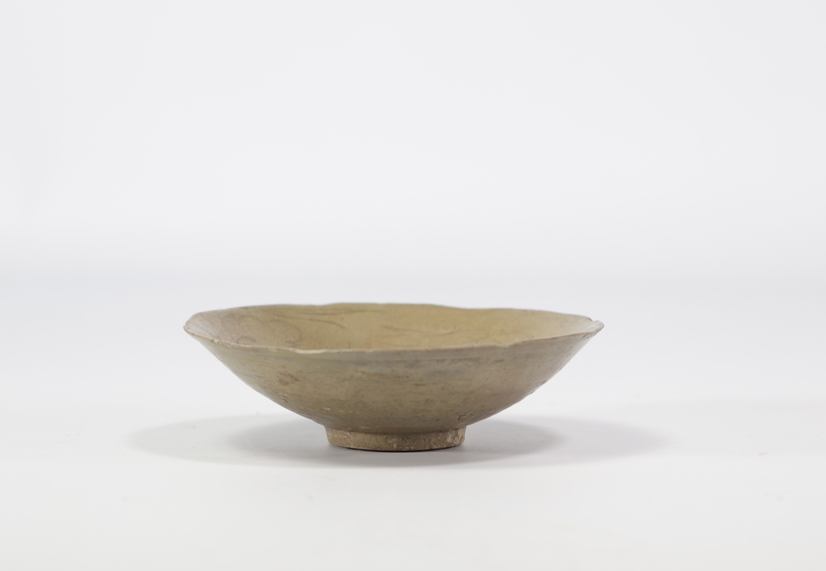 A celadon bowl with incised decoration, China, Song Dynasty - Image 2 of 3
