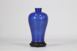 Mei Ping vase in powder blue with wooden base from 18th century