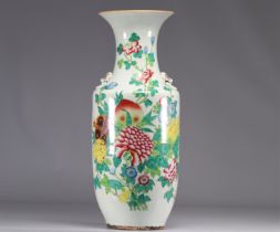 Famille rose porcelain vase decorated with flowers and peaches from 19th century