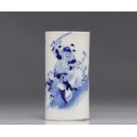 Chinese porcelain brush holder in white and blue with warrior design from the 19th century