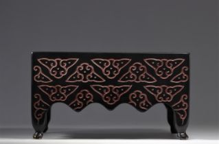 Carved wooden base with geometric decoration from China