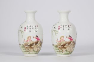 (2) Pair of Famille Rose vases in fine porcelain decorated with figures and landscapes, Qianlong mar