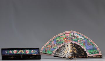 Fan decorated with brightly coloured figures from China, late 19th century