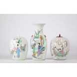 (3) Famille rose porcelain vases decorated with figures and flowers on a white background