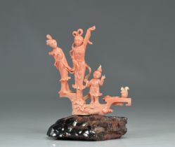 Pink coral sculpture of young women and children from China, Republic period