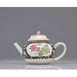 Famille rose porcelain teapot with flower design