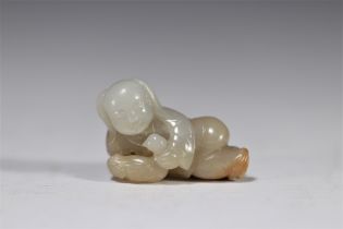 A grey and rust jade figure with a hen from the Qing Period (æ¸…æœ)