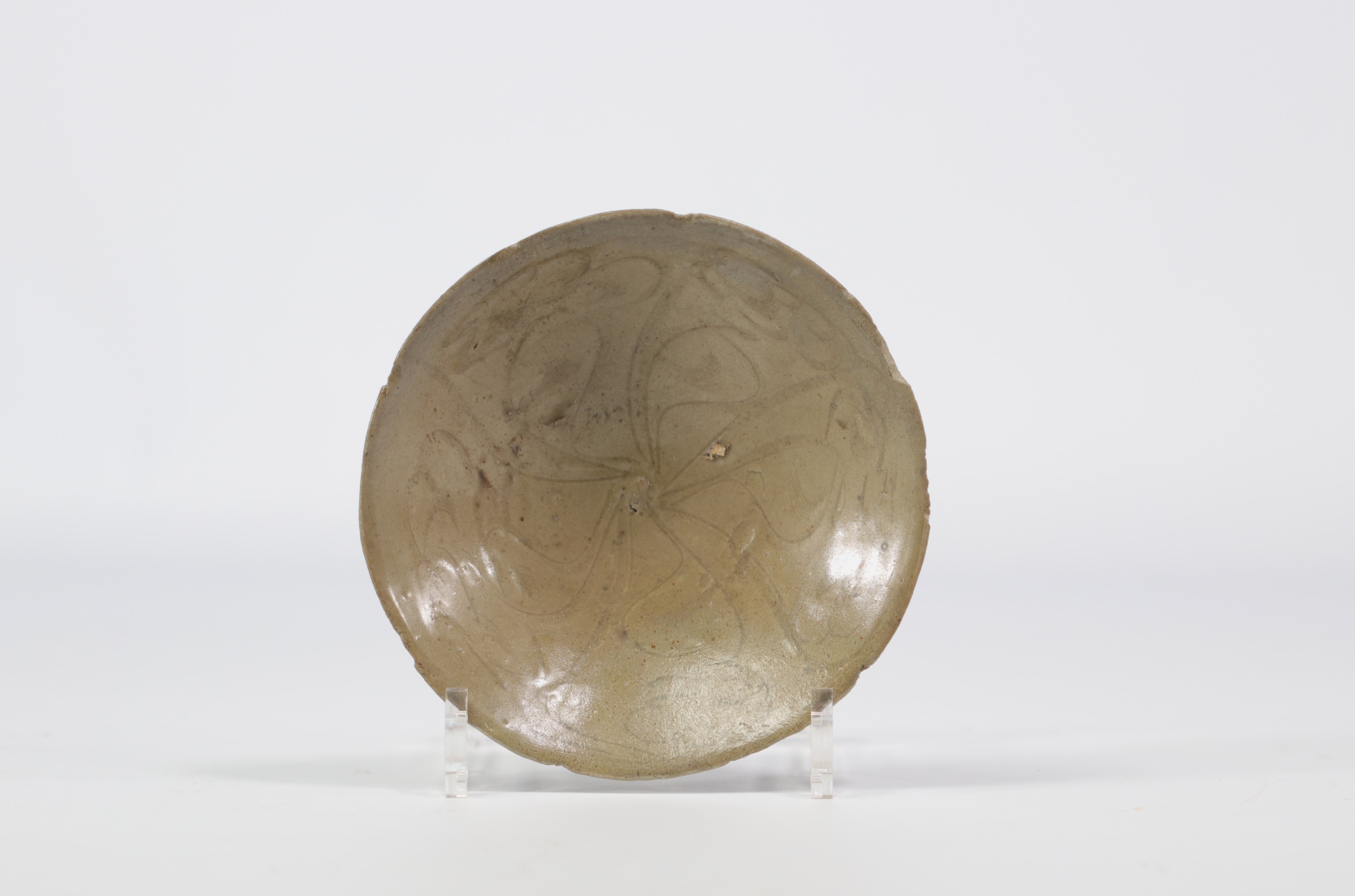 A celadon bowl with incised decoration, China, Song Dynasty