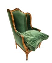 Emerald green armchair in carved wood in the Louis XVI style