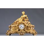 Gilt bronze clock surmounted by a young woman from 19th century