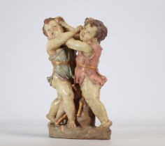Polychrome terracotta sculpture in the shape of two boys called "la dispute"