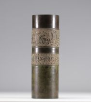 Dark bronze scroll vase with archaic decoration