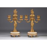 (2) An attractive pair of gilt bronze candlesticks with cherubs from the Napoleon III period
