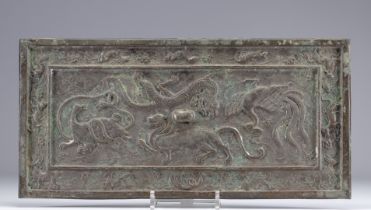 Bronze plaque decorated with animals in relief originating from Asia from 19th century