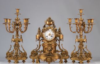 Garniture pendule et candelabres en bronze dore richement decoree