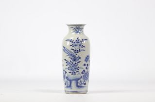 White and blue porcelain vase decorated with birds and flowers