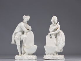 (2) pair of white porcelain statues of figures from MEISSEN