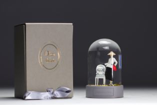 Christian Dior. "Collection Bar Haute Couture Printemps-Ete 1947". Glass snow globe on matte gray ba