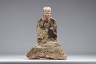 Stone carving of a figure from the Han period, trace of polychromy