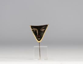 Jean Cocteau. "Face triangle". Bronze polished and gilded with fine gold, red enamel. Eyes: sapphi