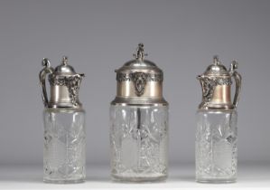 Set of (3) cut crystal decanters, silver-plated metal mount, 19th century.