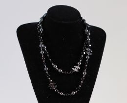 Chanel France, Necklace with black synthetic pearls and grey pearls