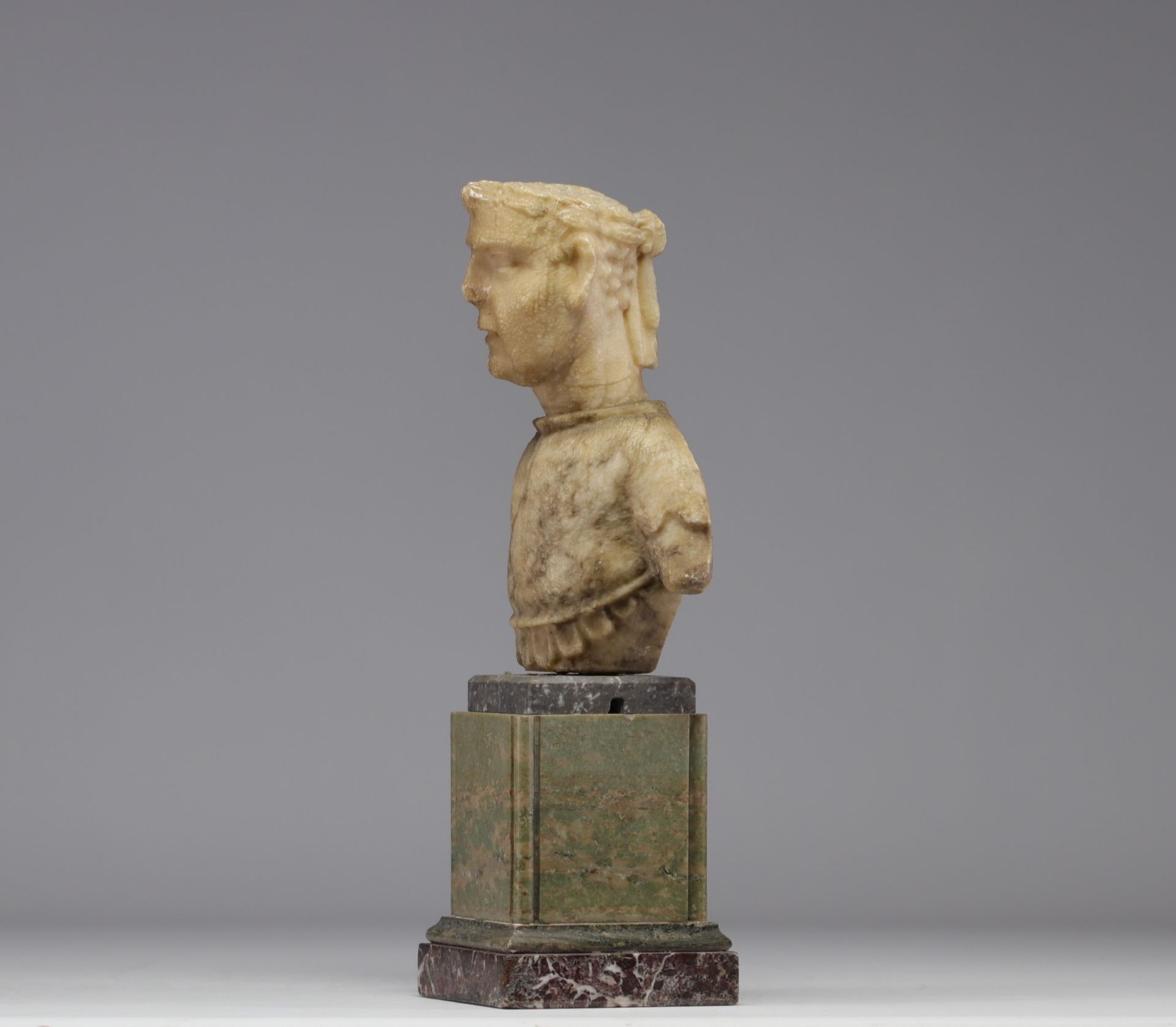 Ancient marble or alabaster element representing a Roman bust. - Image 2 of 4