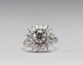 Ring in 18k white gold and diamonds (17 stones for a total weight 5.25).