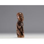 Rare Bas-Congo statuette in carved wood with scarification marks and nails from the 1900s