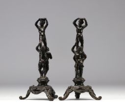 (2) Pair of bronze figures on tripod base.