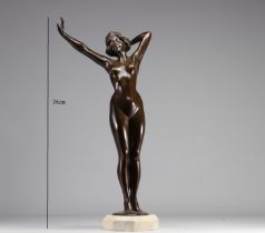 Large bronze "l'eveille" nude young woman on a marble base