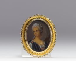 Miniature portrait mounted on an 18k gold brooch. WEIGHT 12.60