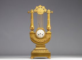 Gilt bronze Lyre-shaped clock from the Empire period