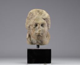Fragment of an ancient "young woman's head" marble sculpture