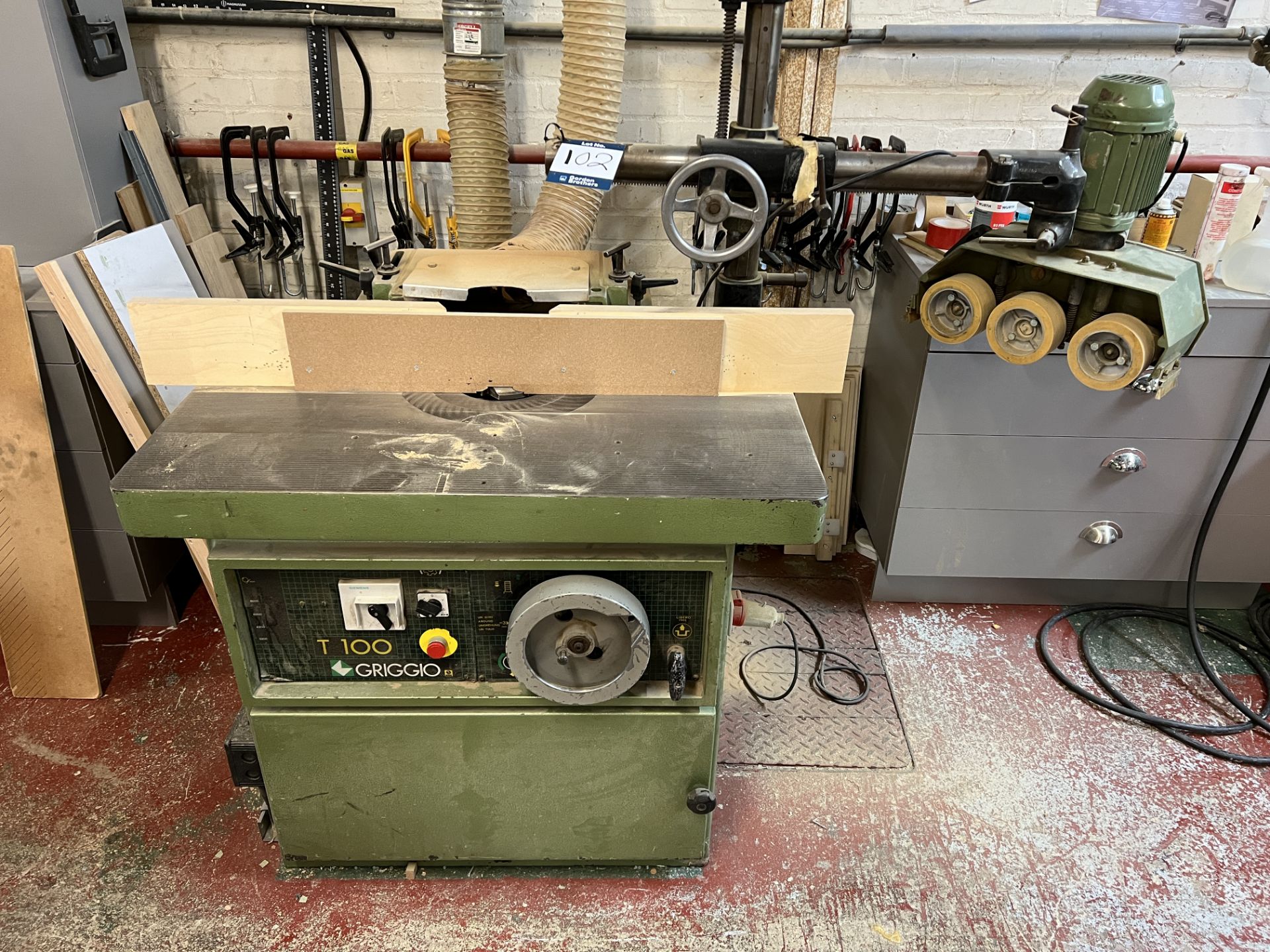 Griggio T100 spindle moulder, 1000mm x 640mm table fitted with Burgreen BLG-8 power feeder unit, S/