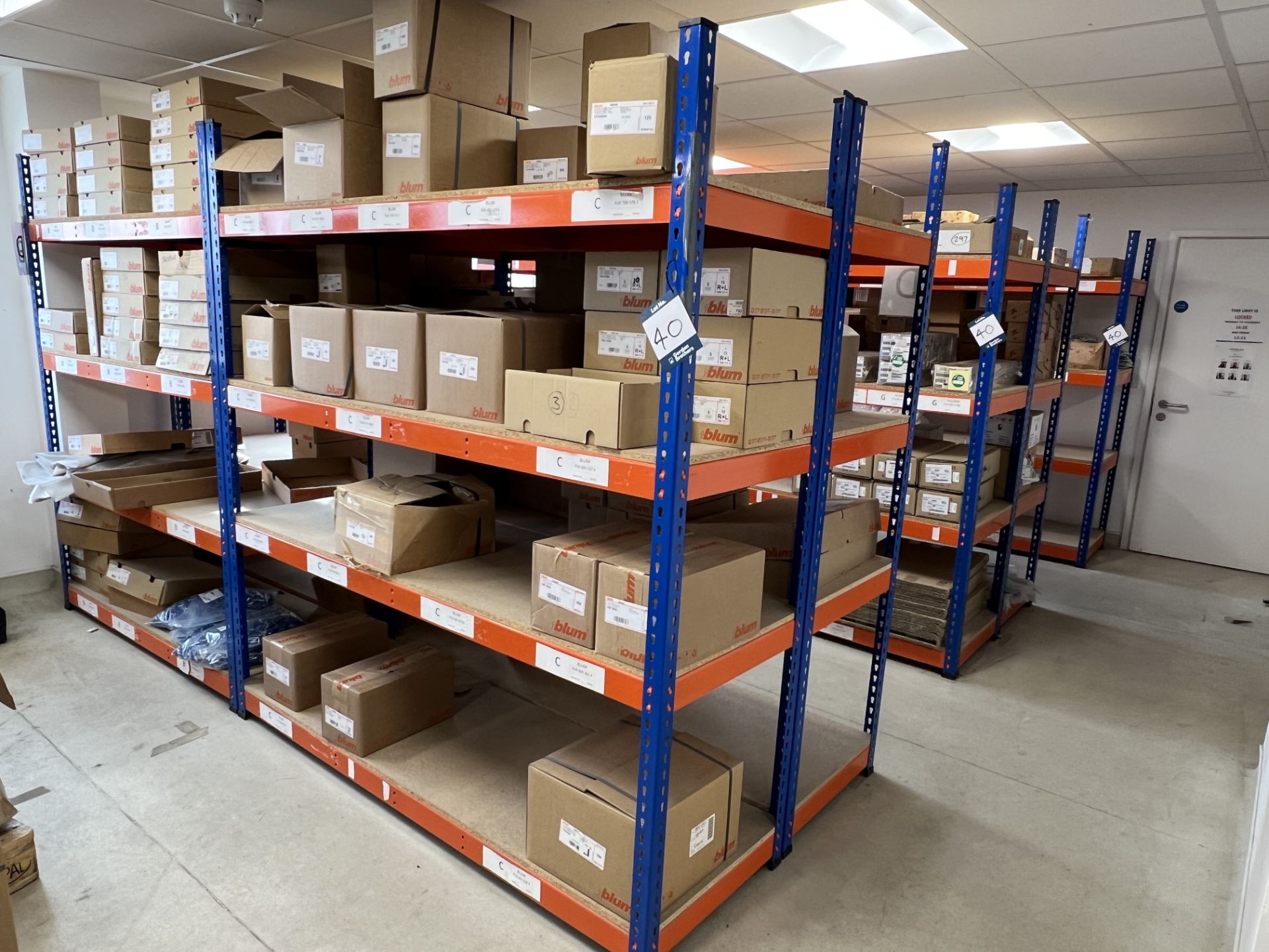 Rapid Racking light duty adjustable shelving with chipboard shelve inserts, consisting od LA72 and