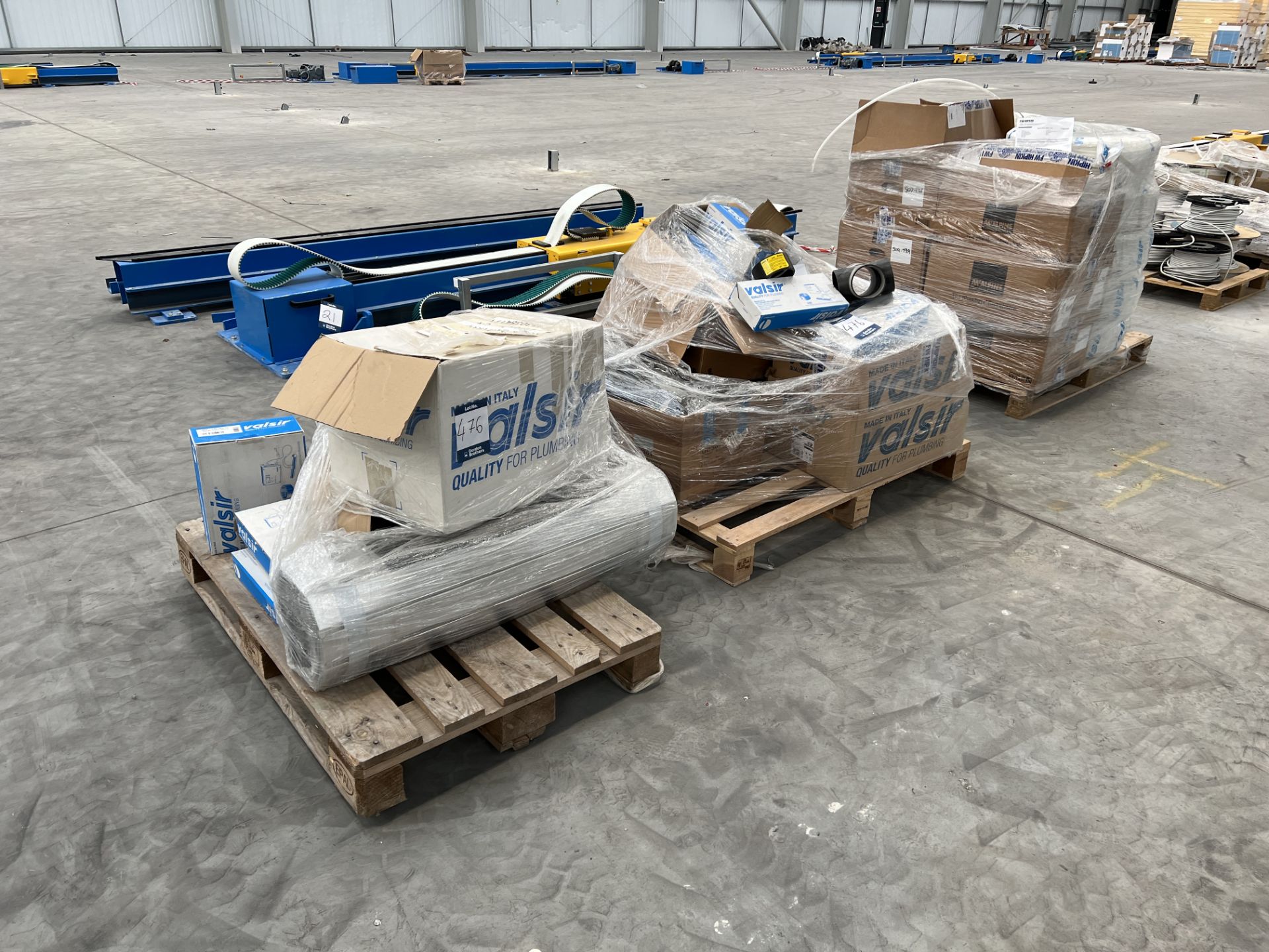 Three pallets with various plumbing related parts to include Valsir PE plastic fittings, S12.5 HD PE