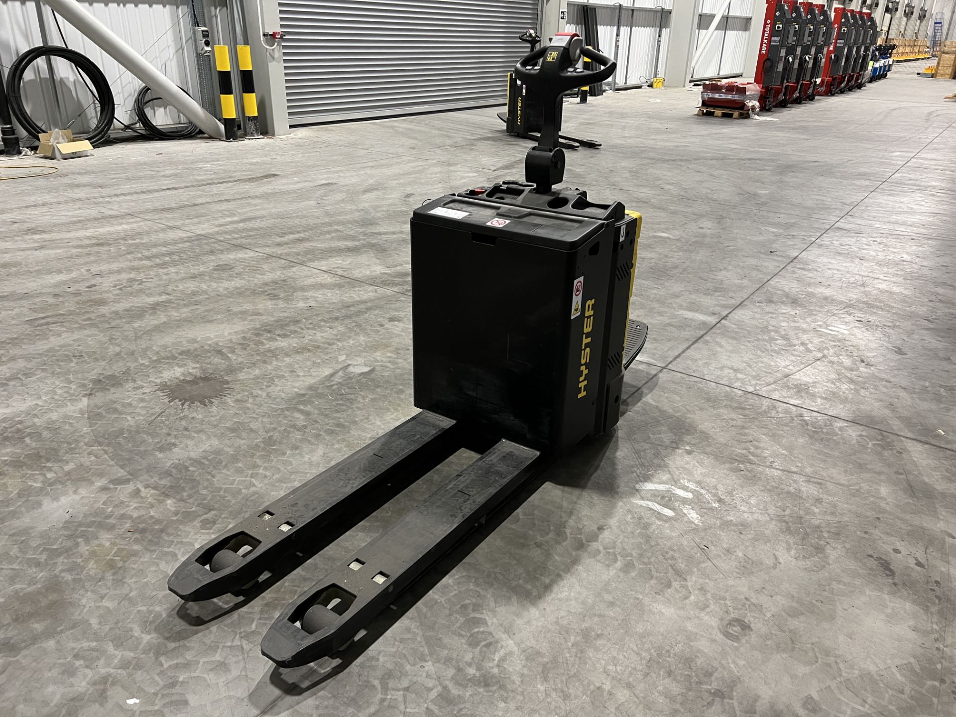 Hyster P2.0SE battery electric ride on low lift pallet truck, S/No. B978T02859V (2021), hours: 9. - Image 2 of 9