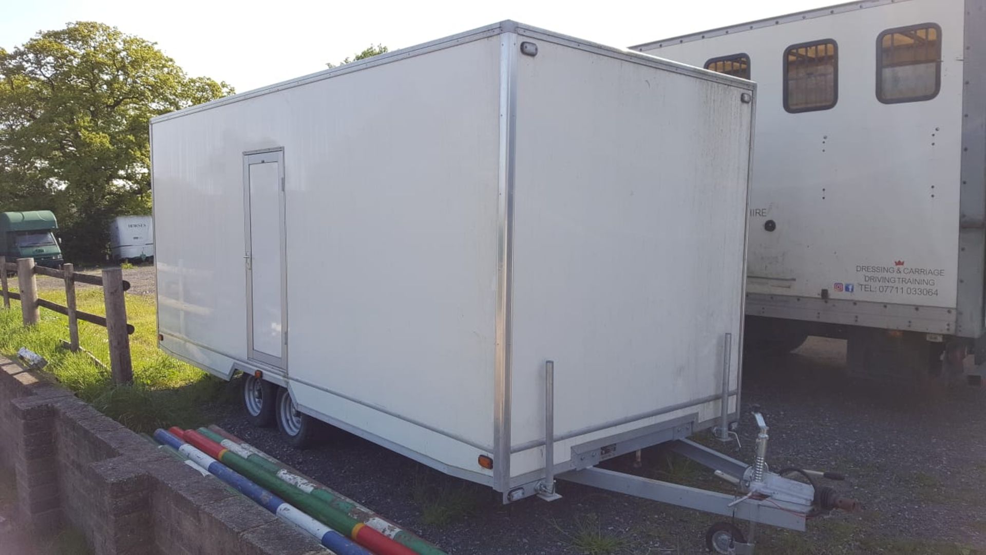 Green Pod Company mobile hospitality male and female trailer toilet block, White modern exteriors