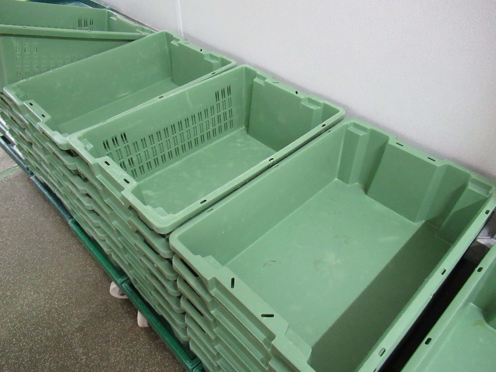 35 Green plastic stacking boxes with 10 dollies - Image 2 of 5