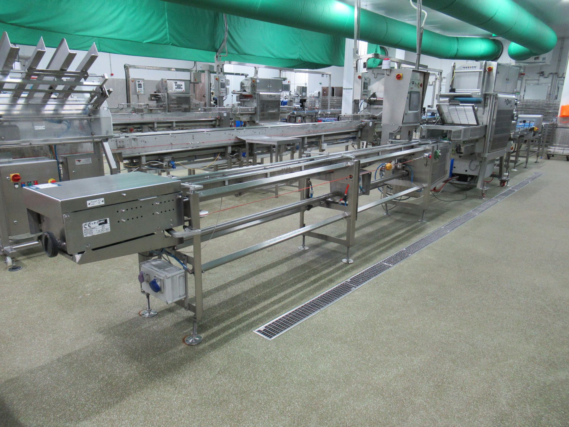 ALL INCLUSIVE LOTS 9-13: Tray filling and sealing line 2 comprised of; Proseal APC chain conveyor. - Image 2 of 56