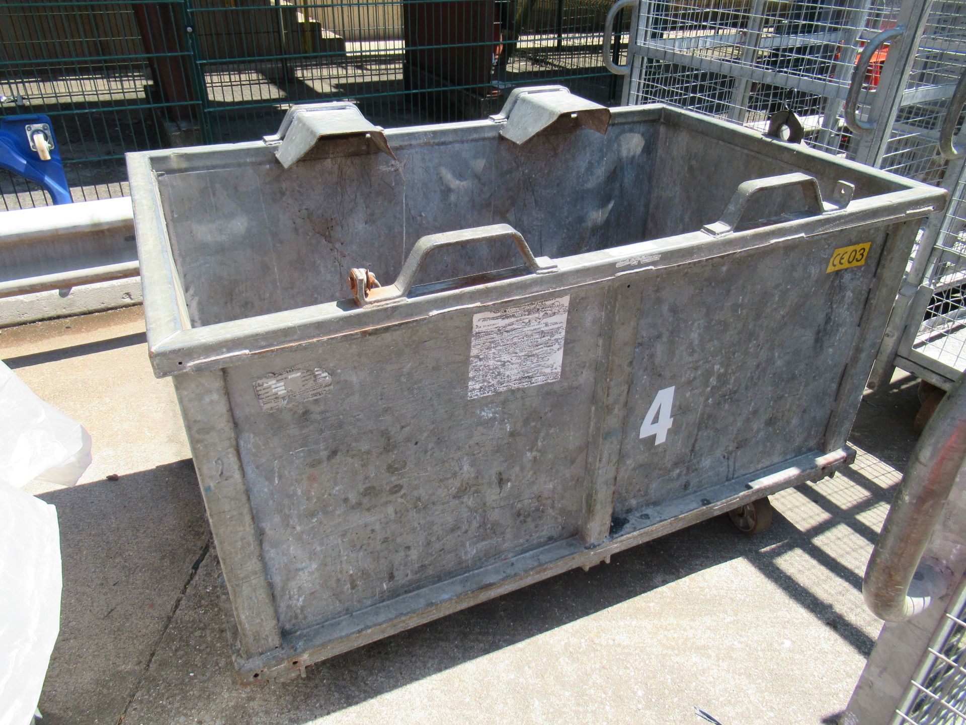 4 Galvanised mobile four wheel waste bins, 1600 x 950 x 750mm high with fold down draw bar