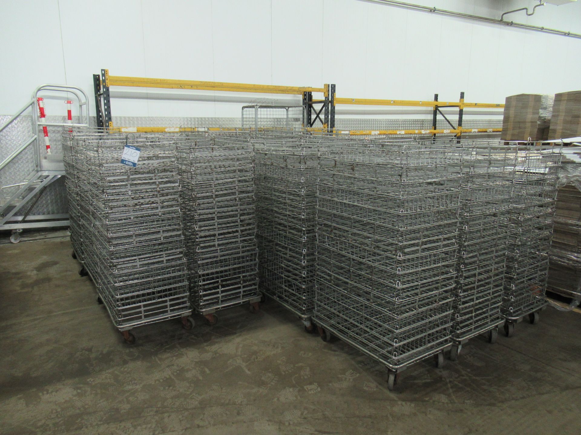 300 Stainless steel wire mesh stacking baskets, 800 x 520 x 75mm high, with 20 dollies