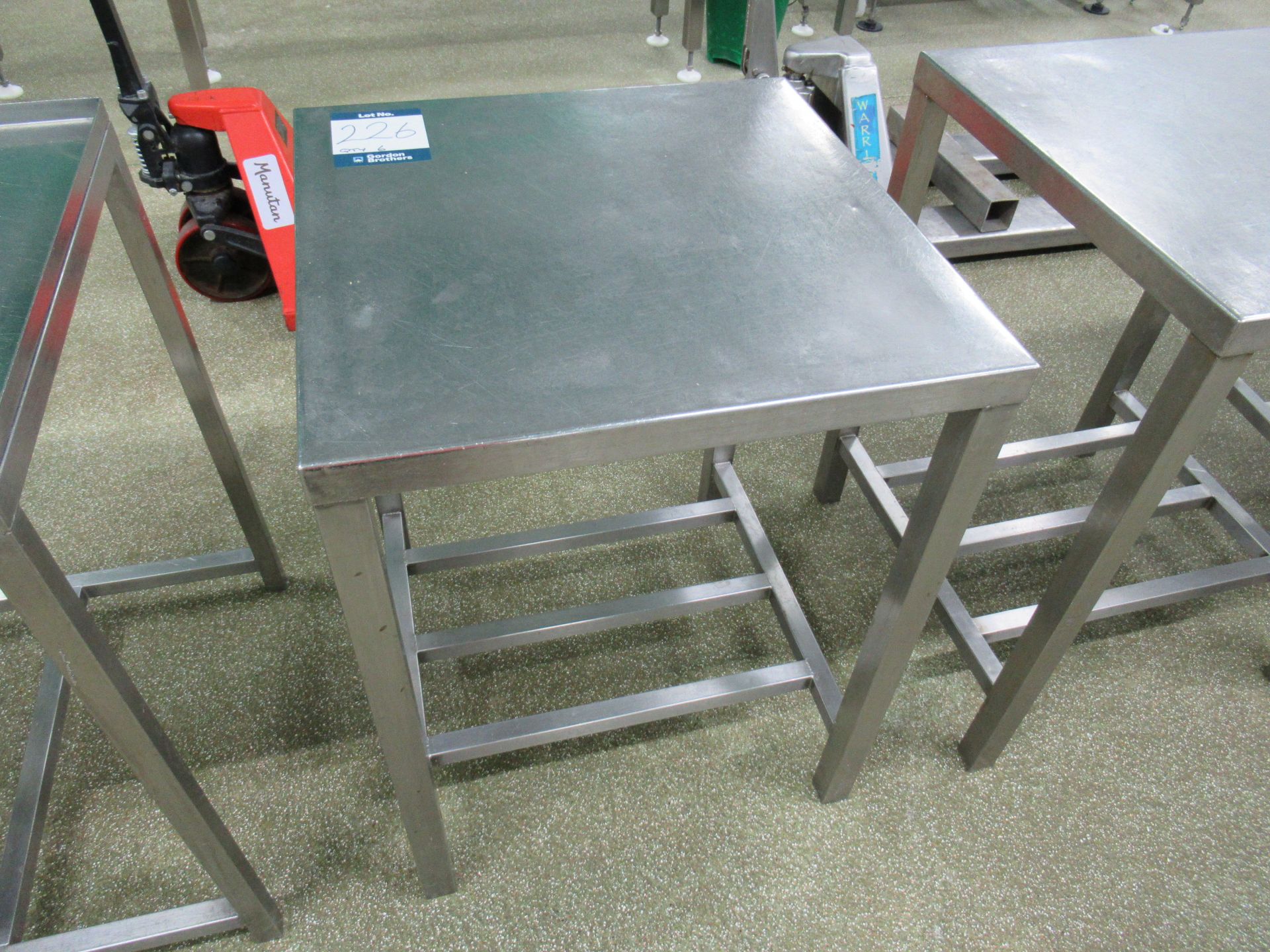 6 Stainless steel tables with 600 x 600mm work surfaces, two with upstands and angled front - Image 4 of 8