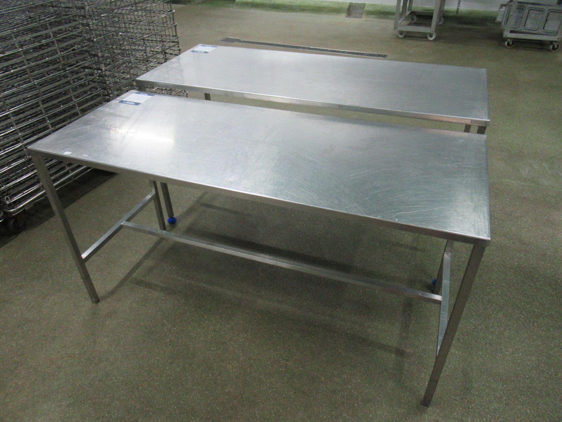 2 Stainless steel tables with 1500 x 600mm work surface